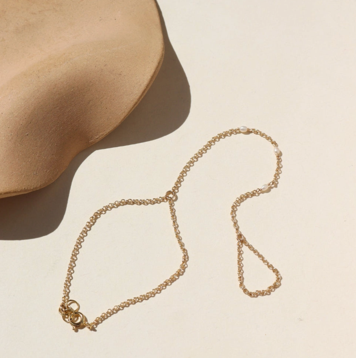 gemini pearl hand chain bracelet