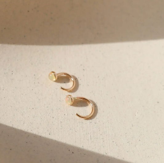 opal glow huggie earrings