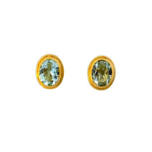 faceted oval aquamarine framed stud earrings