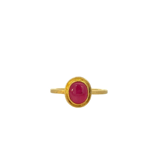 oval ruby cabochon framed ring