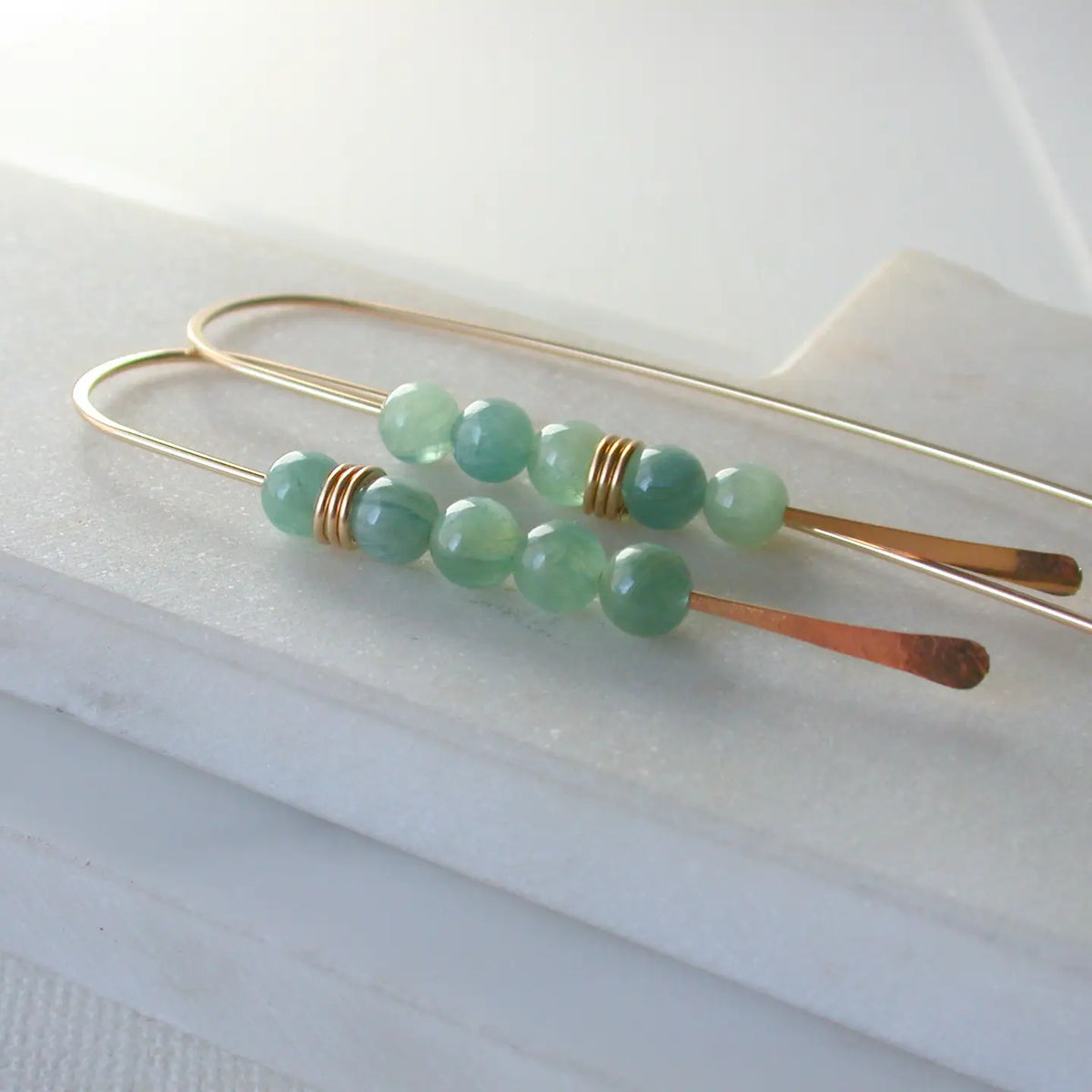 long curving earrings - moss aquamarine