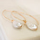 open marquise curving shape earrings - teardrop pearl