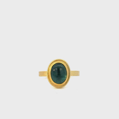 indicolite cabochon oval framed ring