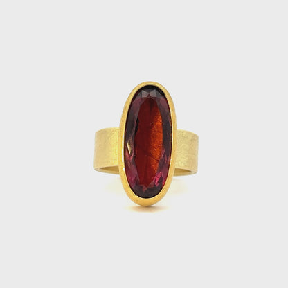 faceted oval tourmaline ring