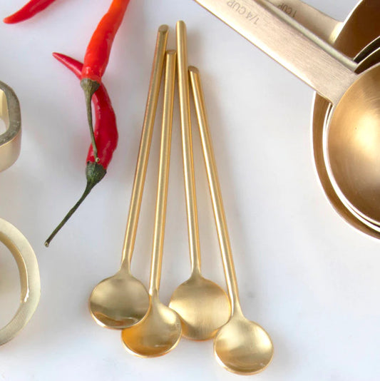 thin gold spoon