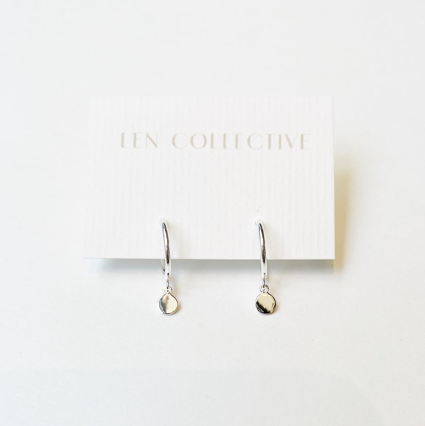 dangling disc post hoop earrings