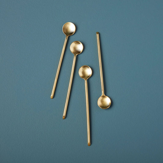thin gold spoon