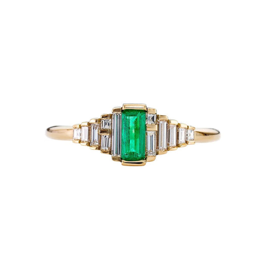 dainty emerald engagement ring with needle baguette diamonds - made to order