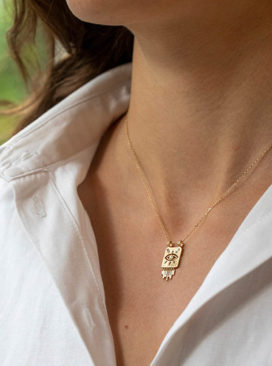 dangling eye diamond necklace