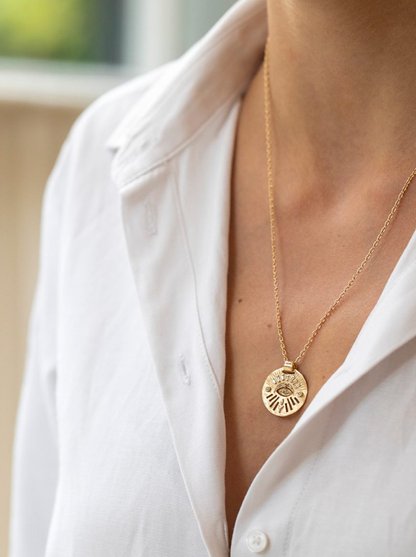diamond dangling eye medal necklace