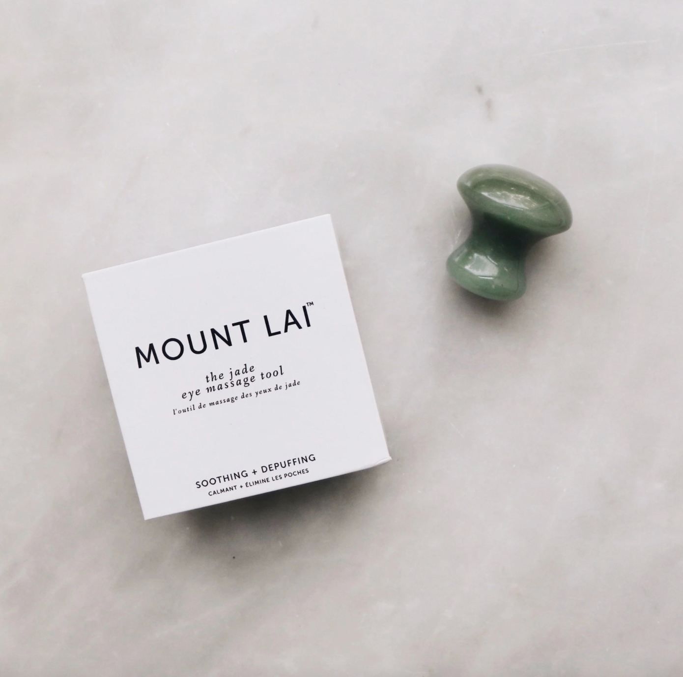 de-puffing jade eye massage tool