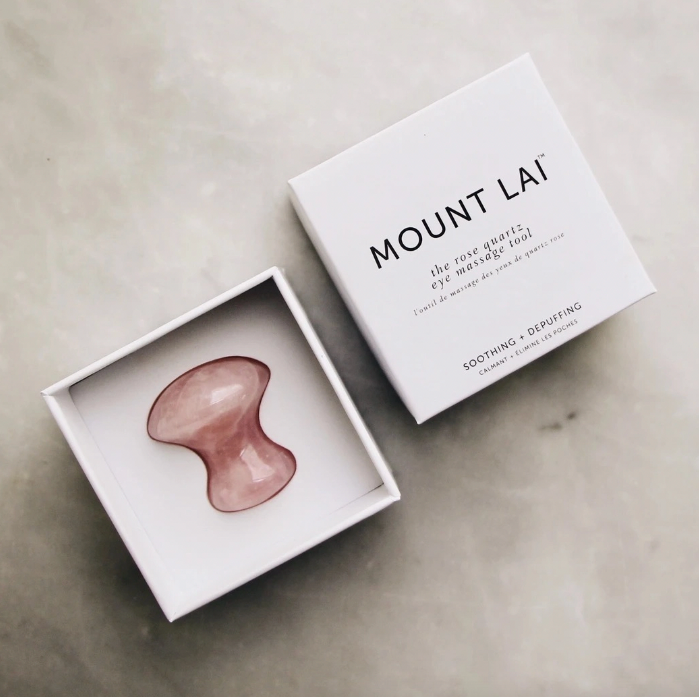 de-puffing rose quartz eye massage tool