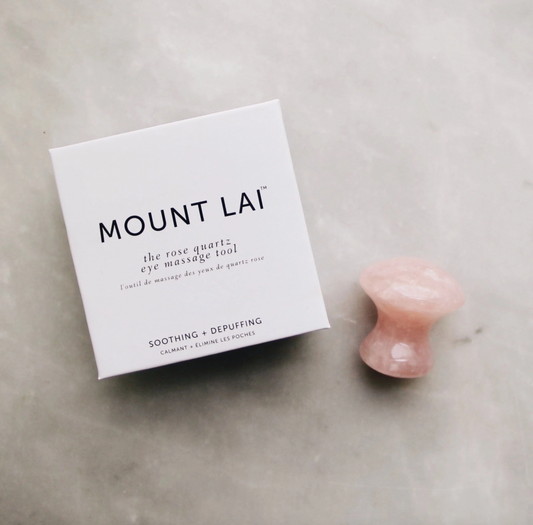 de-puffing rose quartz eye massage tool