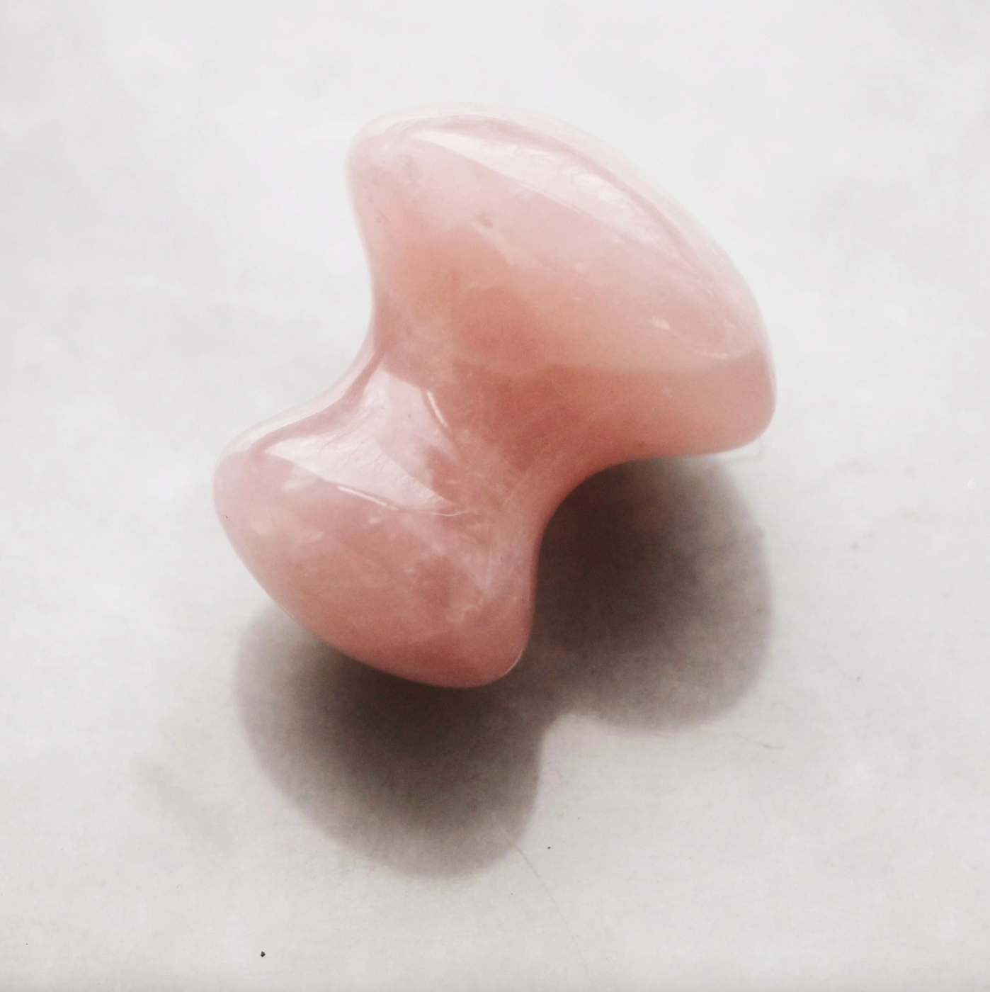 de-puffing rose quartz eye massage tool
