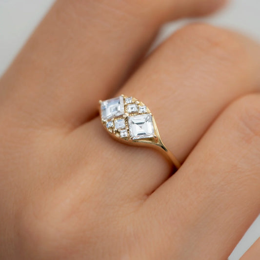 step cut engagement ring with eight square diamonds - made to order