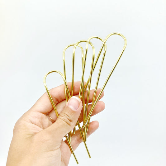 brass hair fork